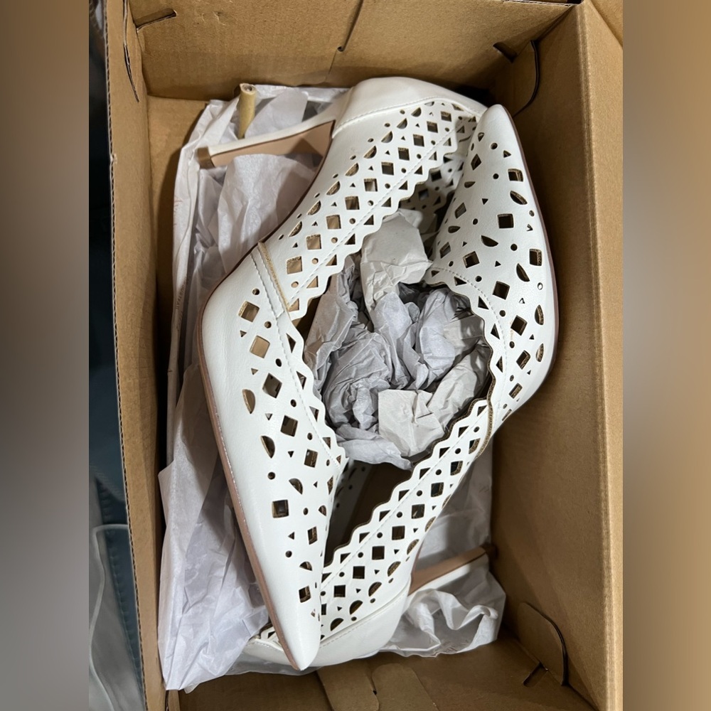 Gently used justfab shoes in the box.